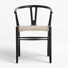 Designer @renouveau_hom made this dining room corner into an eclectic nook. Crescent Black Rush Seat Dining Chair Reviews Crate And Barrel