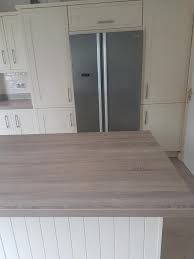 Oak worktops will mature and darken gradually, deepening to perfection over time. Cabra Kitchens Dalton Kitchen With Robinson Oak Worktop Facebook