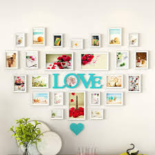 But you can get as creative with it as you'd like. Amazon Com Yubin Photo Frames Multiple Photos Wooden Photo Frame Heart Shaped Photo Wall 12 Picture Frames Set Wall Gallery Collage Frames With Hanging Template Color D