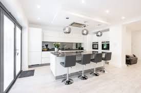 Editors' ideabooks with this photo. High Gloss Kitchens White Cream Black Kitchen Units Blax Kitchens