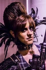 Styling her new sweater and matching Pastrnak hair do....