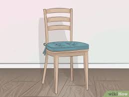 Then, pin around the chair seat and connect it to the fabric over the chair back. 4 Ways To Cover Dining Room Chairs Wikihow