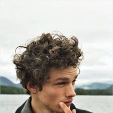 The short sides, long top style is further enhanced by the skin fade made just above the ears. 45 Short Curly Hairstyles For Men With Fabulous Curls Men Hairstylist