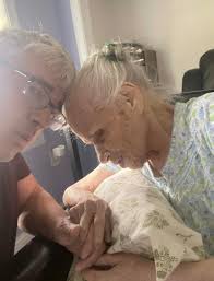 Can someone enhance the photo of your mother?