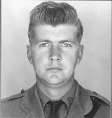 Troop C Commander, Major William McEvoy (right) congratulating Investigator  Timothy Mulvey