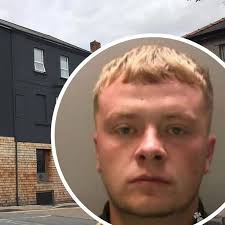 Masked man kicked down hotel door and threatened former partner with knife 