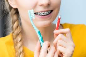 Brushing your way to beautiful braces with dudley smiles. Manual Or Electric Which Toothbrush Should You Use Huyser Orthodontics Grand Rapids Mi