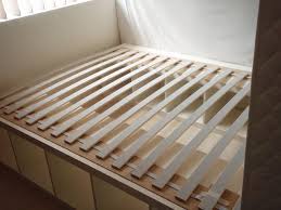 Expedit Re Purposed As Bed Frame For Maximum Storage Ikea Hackers Diy Storage Bed Ikea Bed Hack Bed Frame With Storage