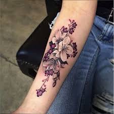 Stars and orchid tattoo on back Half Sleeve Orchid Tattoos Ideas Flowertattooideas Com