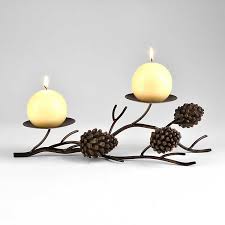 I wasn't going to craft today but after my daughter brought home some pinecones from the park, i had to make something with it! Pine Cone Candle Holder Kirklands