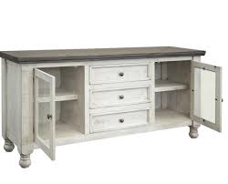 Thankfully, there's no storage cabinet more forgiving than a mid century modern sideboard. International Furniture Direct Stone Relaxed Vintage Buffet With 2 Glass Doors And 3 Drawers Johnny Janosik Buffets