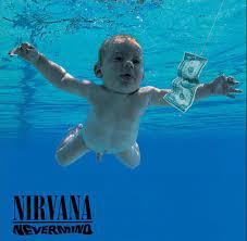 Nevermind is the second studio album by american rock band nirvana, released on september 24, 1991, by dgc records.produced by butch vig, it was nirvana's first release on the dgc label, as well as the first to feature drummer dave grohl. Naked Baby From Nevermind Album Cover Sues Nirvana For Child Pornography Cbc News