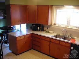The two colors can look very different when paired with different countertops , flooring, and subway tile backsplash , and are often used to complement each other in different kitchens. Decorating Ideas To Add Light To A Dark Kitchen Renee S Retro Design Dilemma