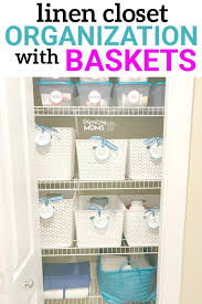 Roll and stack towels in a pyramid on a shelf in your linen closet to keep the space organized. Linen Closet Organization With Baskets A Simple Way To Eliminate Visual Clutter Organizing Moms