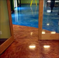 It is absorbed into the mortar and cannot peel, fade or crack. Acid Staining Concrete Installation Concrete Acid Stained Services Milwaukee Waukesha Indoor Concrete Floors Patios And Stairs Garage Floors Basement Floors Walkways Living Space Floors All Types Of Concrete