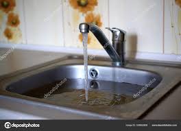 stainless steel sink plug hole close up