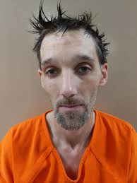 Update: Woman accused of hiring man to kill estranged wife's family