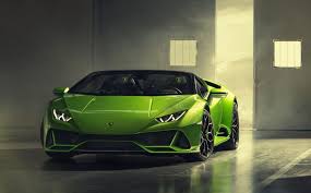 The 640 hp naturally aspirated v10 engine roars with authority, as the exhaust announces the presence of a formidable machine. 2019 Lamborghini Huracan Evo Spyder 538076 Best Quality Free High Resolution Car Images Mad4wheels