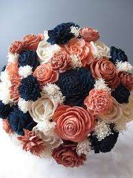 The silk garden hydrangea is custom dyed just for us in gorgeous shades of blue. The Princess Rose Gold Navy Blue Blush And Ivory Wood Flower Wedding Bouquet In 2021 Rose Gold Wedding Decor Flower Bouquet Wedding Gold Wedding Decorations