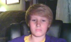 Austin Miller of Lenox, Iowa hides in dryer during tornado