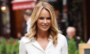 The britain's got talent judge, 49, mixed things up on monday night and donned a red carpet worthy evening dress to take. Amanda Holden Strikes Flirty Pose In Sheer Utility Dress Hello