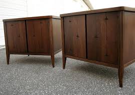The opening times are from a level 10 locksmith's table. Vintage Broyhill Premier Saga Walnut Nightstands
