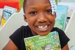 One woman, one child, one red wagon, inspire Christ Child Society of Naples 