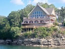 Open floor plan,wide plank flooring & shiplap walls. Perry Real Estate 205 487 Home Lake House Home Lake Cabins