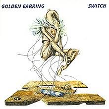 Golden earring is a dutch rock band, founded in 1961 in the hague as the golden earrings (the definite article was dropped in 1967, while the s was dropped in 1969). Switch Golden Earring Album Wikipedia