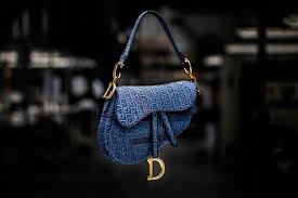 Popular christian dior handbags include the diorama, saddle bag and the classic lady dior (renamed for princess diana as she was known to carry the bag). The Making Of The Dior Saddle Bag A E Magazine