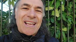 Hedgehog bitting and drinking water bottle