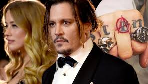 Johnny depp gives evidence on the second day of a libel trial at the royal courts of justice in london. Johnny Depp S New Dissertation On The Amber Heard Tattoo
