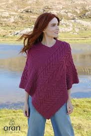 Renewable and sustainable fibres provide insulation against the elements. Aran Merino Wool Knit Poncho Hollands Country Clothing