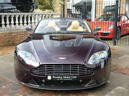 Image result for Amethyst Red 2011 Aston Martin