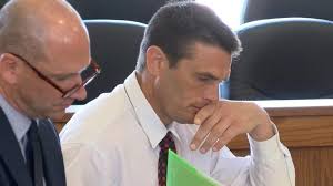 Amundson moves to trial, reinstated as 'fully active' in school district