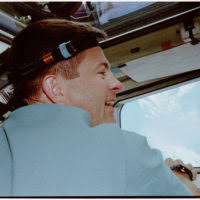 Naval mines are reflected in the sunglasses of Joshua