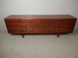 The cheapest offer starts at £30. Long Vintage Modern Dresser W Offset Drawer Pulls At 1stdibs