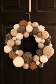 Yarn can be used to make so in crafts yarn can be used for yarn dolls or just for hair on dolls. Handmade Winter Yarn Ball Wreath Holiday Wreath Yarn Etsy In 2020 Yarn Ball Wreath Yarn Wreath Ball Wreath