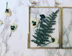 Glass can also be used to press flowers. Make This Pretty Pressed Flower Art Quickly With An Iron Melanie Lissack Interiors