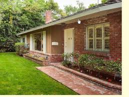 In many cases with brick homes, the color of the brick itself serves as the dominant color. Matching Exterior Colors With Faded Red Brick