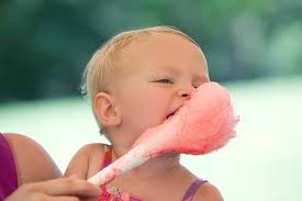 60+ Woman Tasting Cotton Candy Stock Photos, Pictures & Royalty-Free Images 