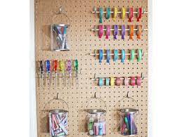 Buckets, containers, bins or mini pails on your pegboard. Get Organized Pegboard Craft Room Storage Idea Fun365