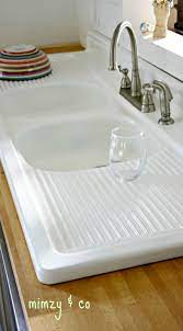 Porcelain sinks require special care and cleaning to keep them looking new. How I Refinished My Vintage Cast Iron Kitchen Sink Mimzy Company Cast Iron Kitchen Sinks Cast Iron Kitchen Sink Vintage Kitchen Sink