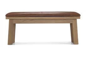 You can experience the magic of a timeless leaf motive brought to life by the hands of a master carver by incorporating these majestic wood carvings into your decor. Holloway Rough Sawn Oak Dining Bench Quercus Living
