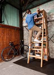 Cut list for building a rolling library ladder. Modern Bookshelf Features A Hidden Built In Ladder