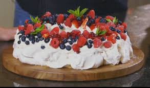 While i am not a huge watcher of cooking shows, i enjoy watching the great british mary's pavlova is topped with pretty berries, but most fruits work well so feel free to use what's in season. Mary Berry Christmas Wreath Pavlova Meringue 6 Egg Whites 350g Caster Sugar 1tsp Cornflour 1tsp White Wine Pavlova Recipe Christmas Pavlova Mary Berry Recipe