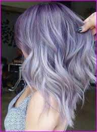 50 Blue Hair Color Ideas Thanks To The Rainbow Hair Trend A Growing Number Of Women Are Dyeing Their Locks Light Blue Hair Light Purple Hair Hair Color Blue