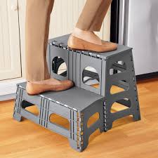 Featuring a lightweight design with handle. 2 Step Stool That Folds Down For Compact Storage Collections Etc