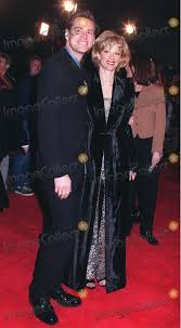 His dumb and dumber costar, lauren holly. Photos And Pictures 06jan97 Actress Lauren Holly Actor Husband Jim Carrey At The Premiere Of Her New Movie Turbulence In Which She Stars With Ray Liotta Pix Paul Smith