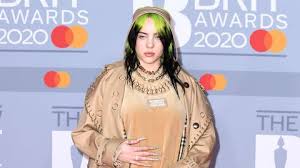 Billie eilish earns a third week at no. Billie Eilish Thinks It S Weird That Anyone Cares About How Her Body Looks